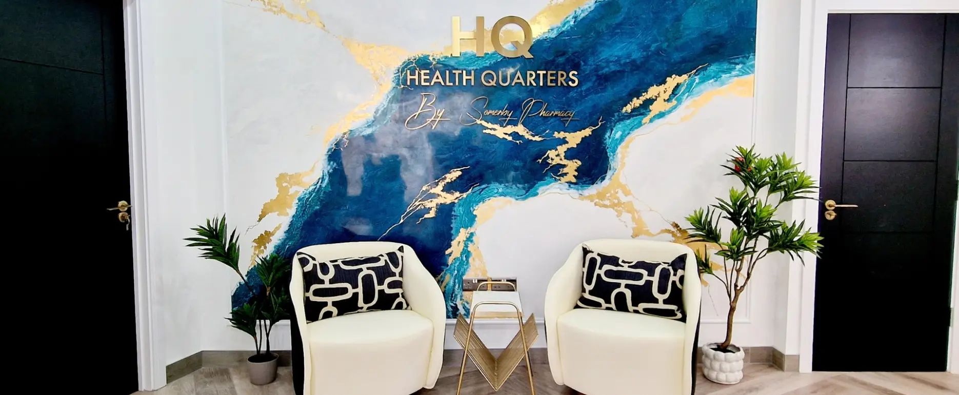 Bright blue and gold waiting area designed for HQ Pharmacy